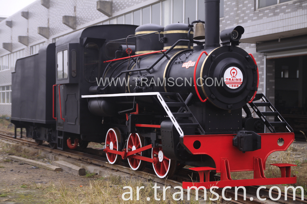 sightseeing train big black locomotive in factory